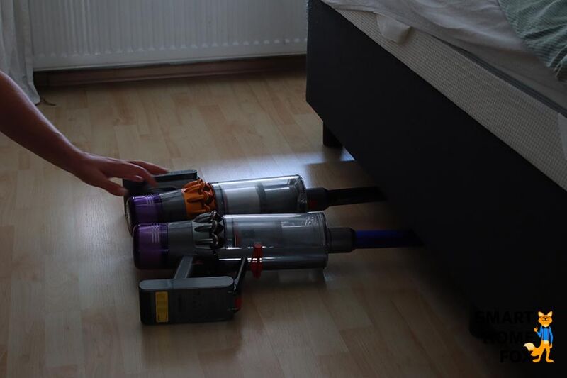 Vacuuming under the bed with the Dyson V15 and V11